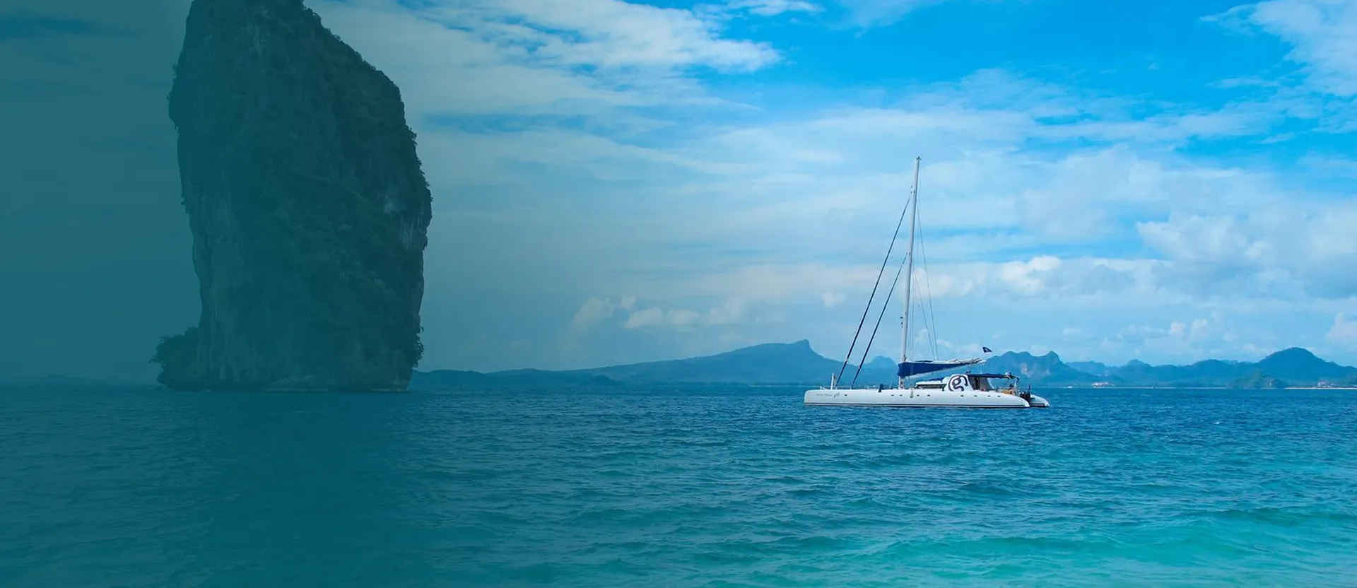 Yacht cruising through the Andaman Sea