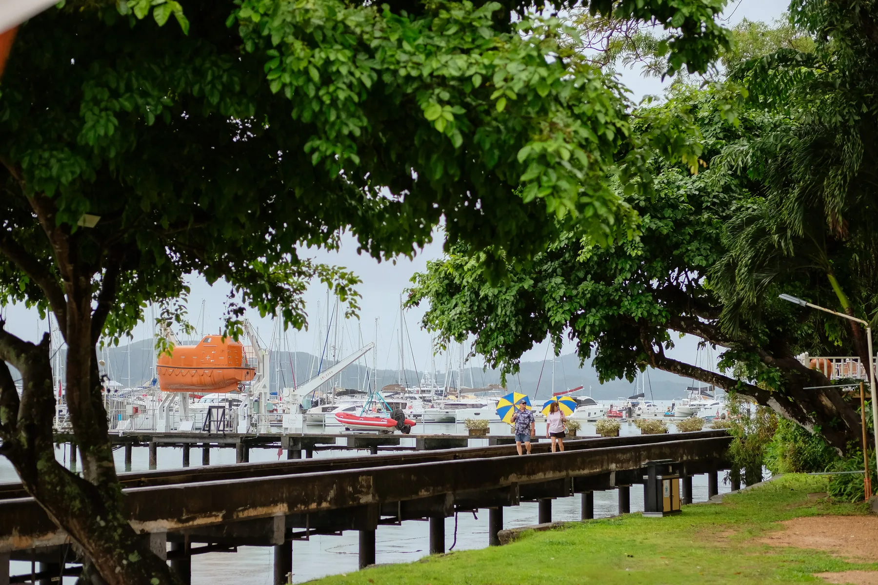Waterside walkway and marina berths at Phuket Yacht Haven